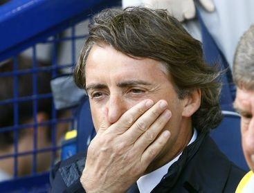Mancini ruka na ustach mancity