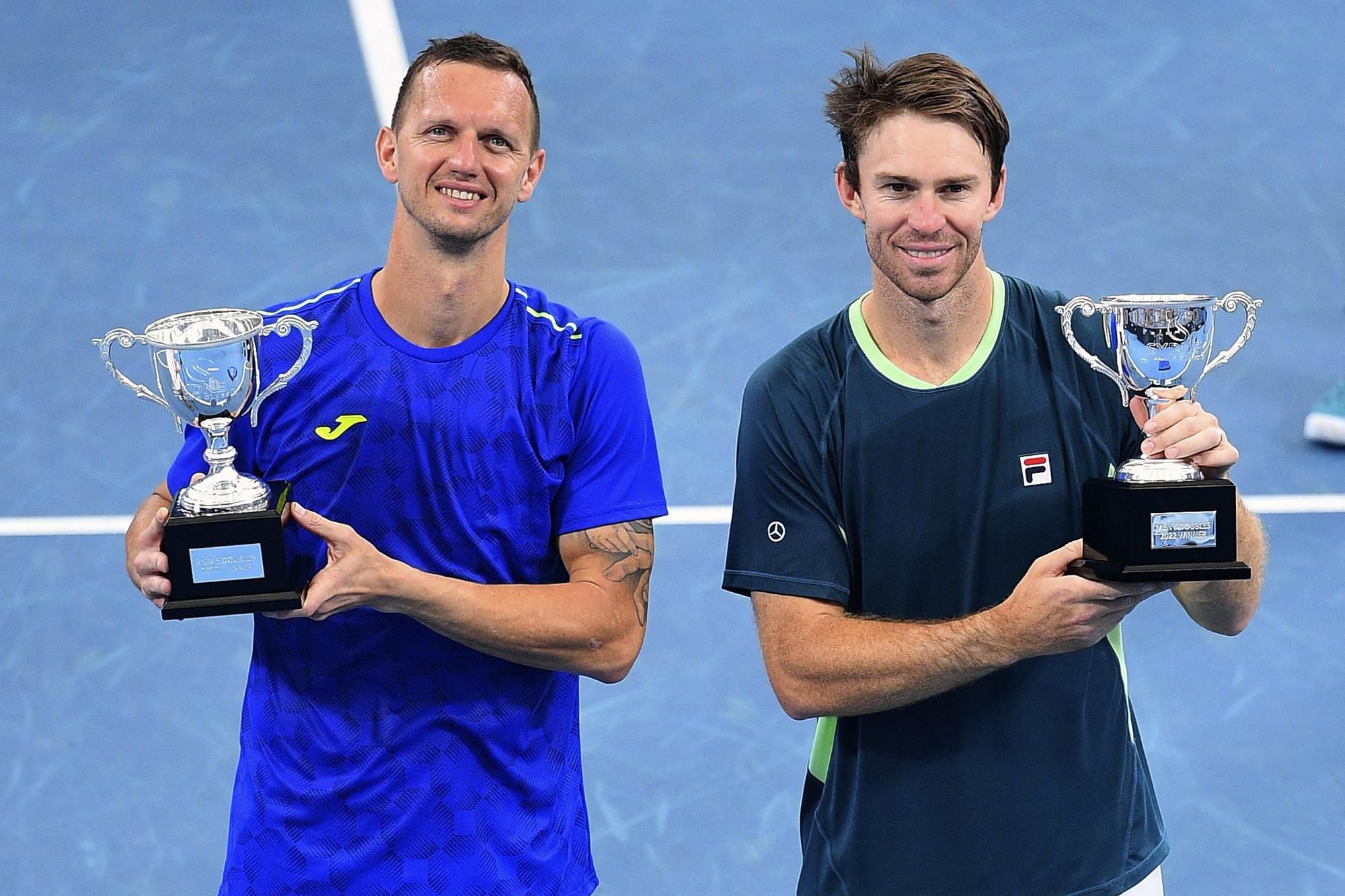 Slovensko-austrálsky pár Filip Polášek (vľavo) a John Peers (vpravo)