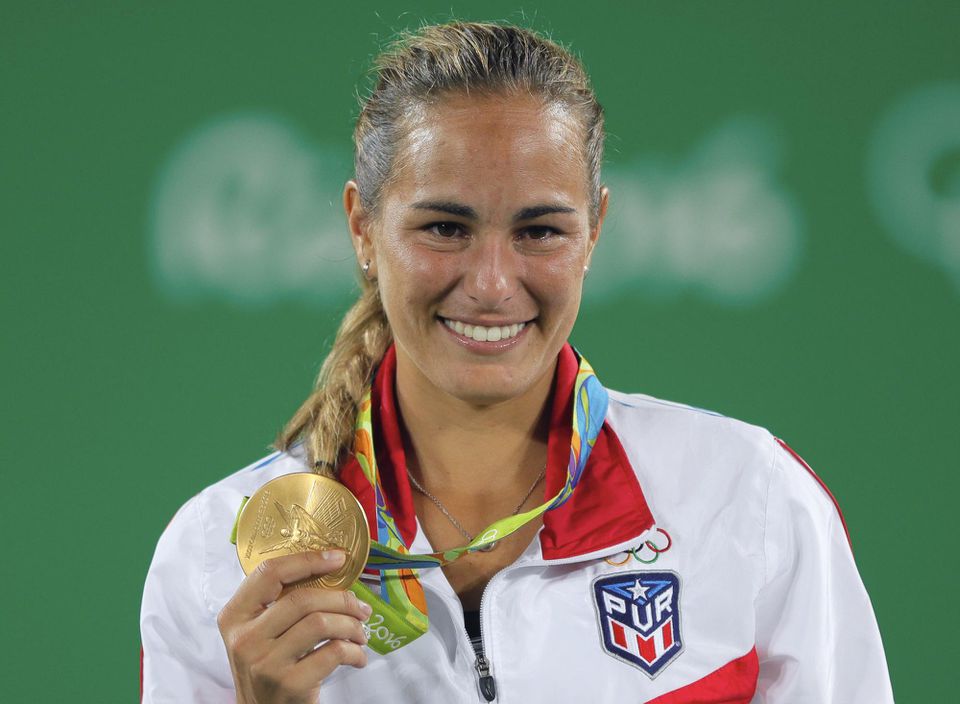 Monica Puigová so zlatou olympijskou medailou z Ria