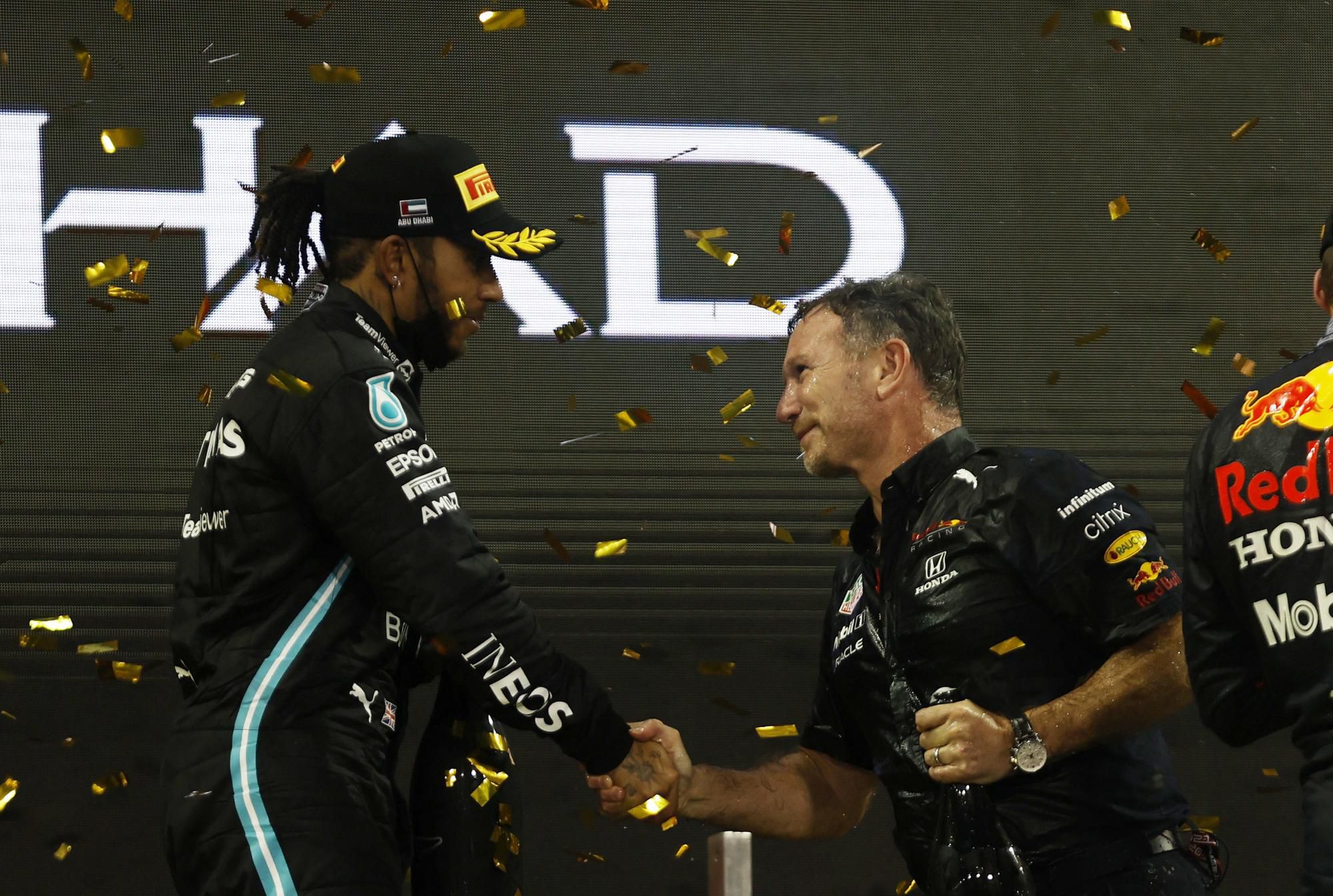 Leiws Hamilton a Christian Horner po Veľkej cene Abú Zabí