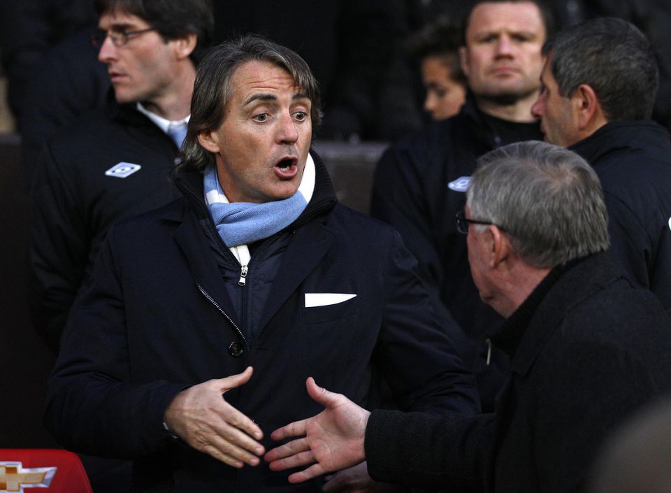 Roberto Mancini a Sir Alex Ferguson