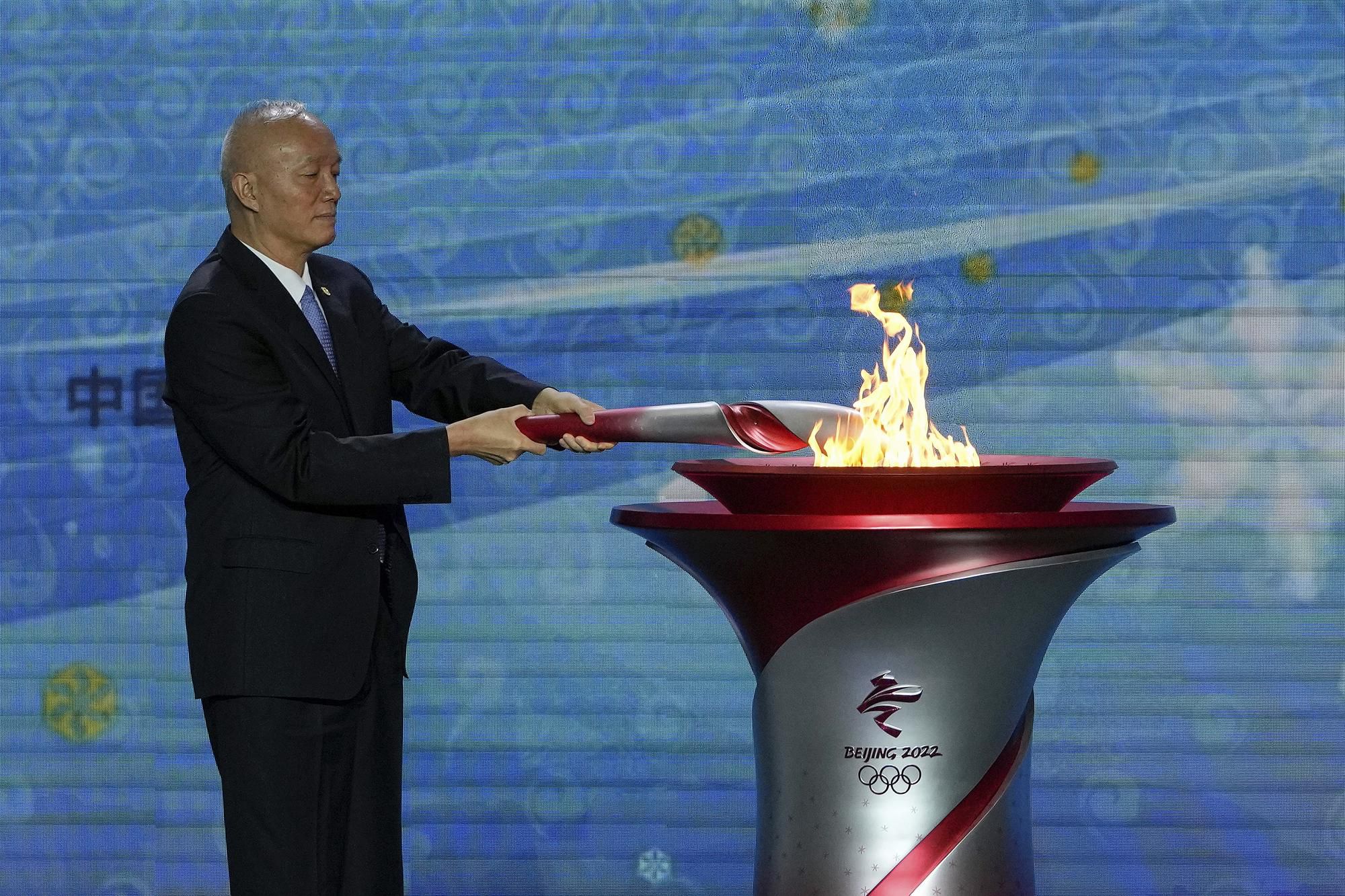 Olympijský oheň je už v Pekingu