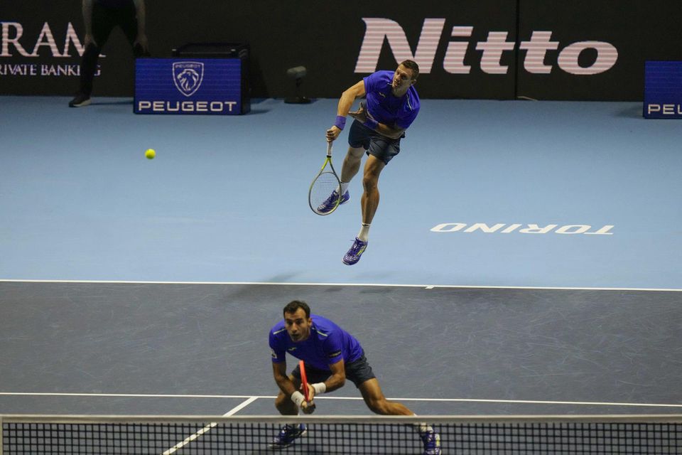 Slovenský tenista Filip Polášek a jeho chorvátsky spoluhráč Ivan Dodig na deblovom turnaji majstrov v Turíne.
