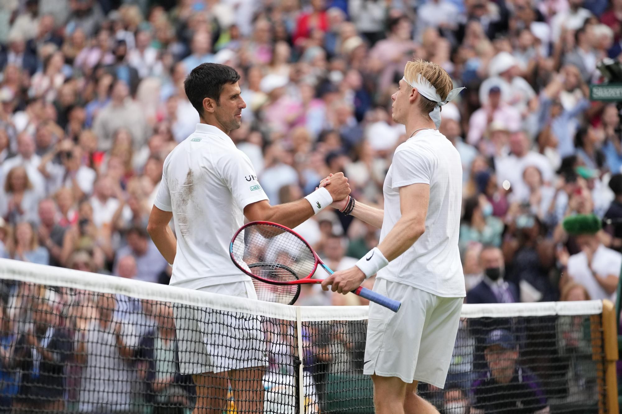 Novak Djokovič a Denis Shapovalov.