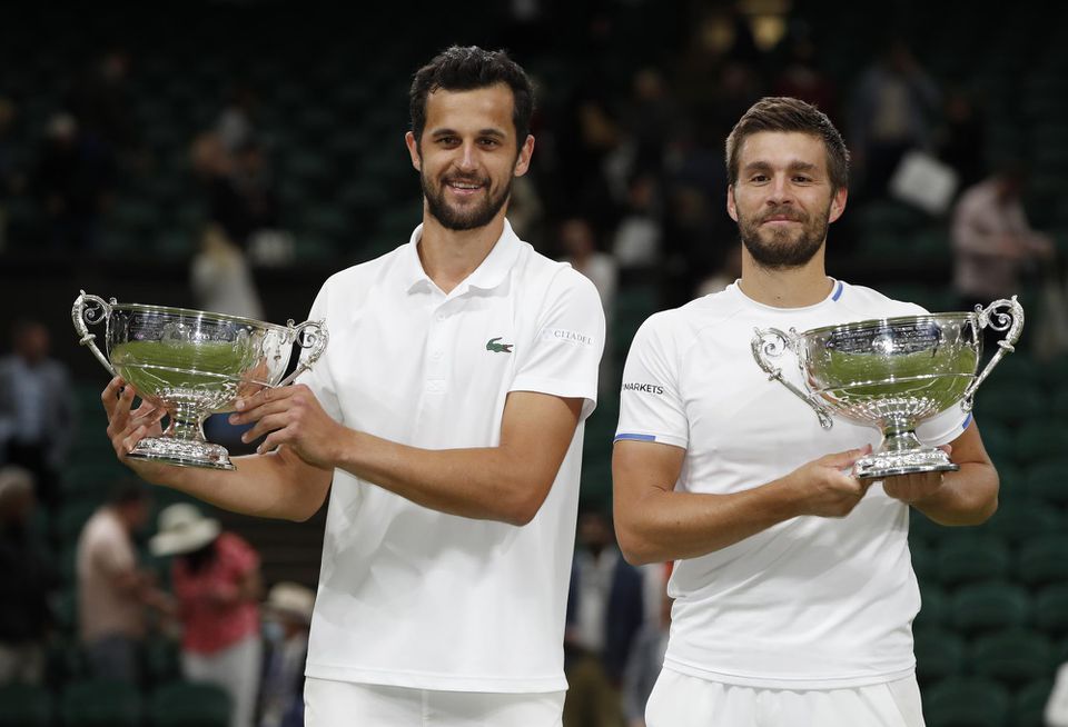 Nikola Mektič a Mate Pavič triumfovali vo štvorhre na grandslamovom turnaji vo Wimbledone
