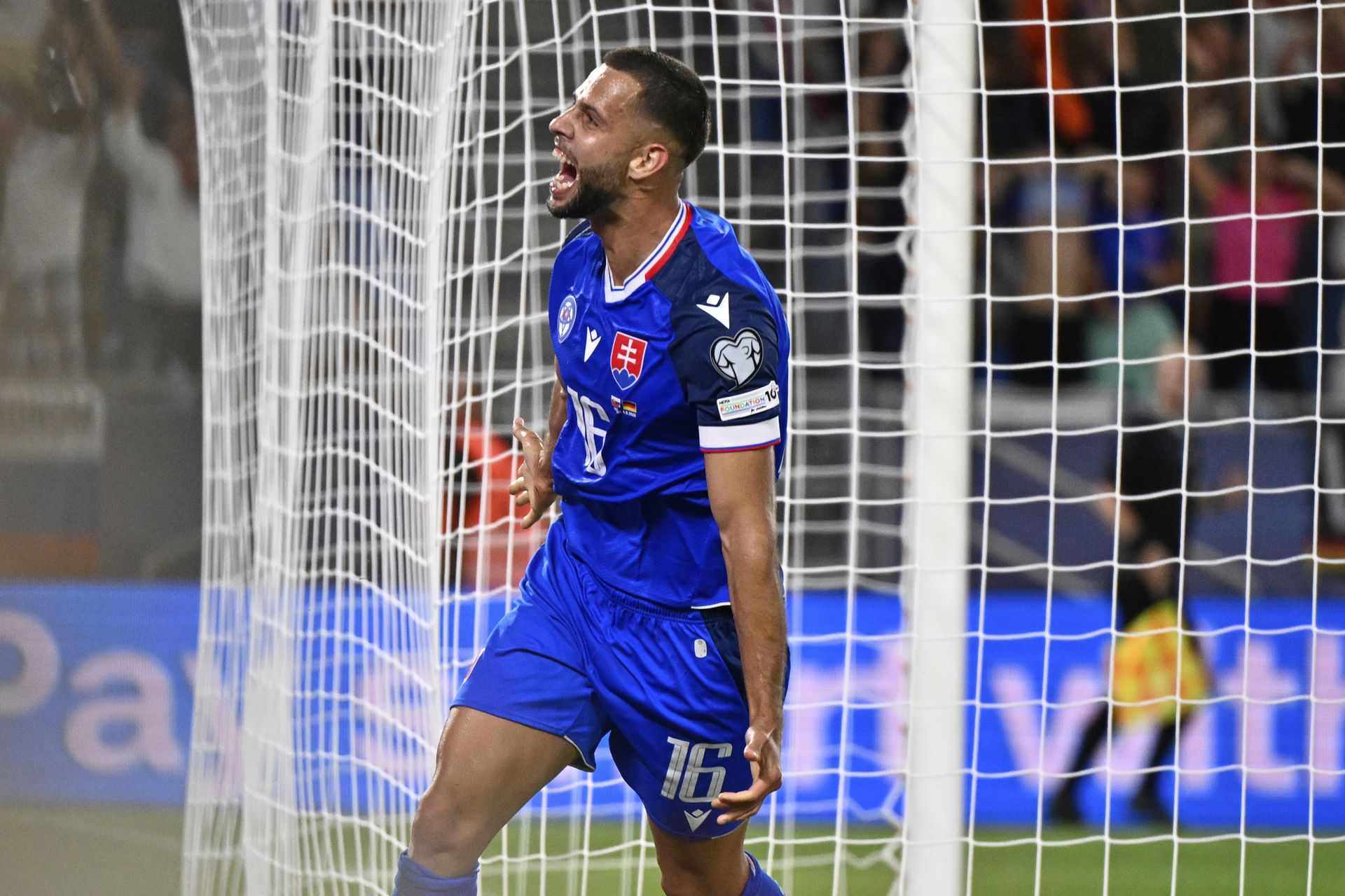 Radosť Dávida Hancka po góle v zápase Slovensko - Nemecko. Zdroj: SITA/AP
