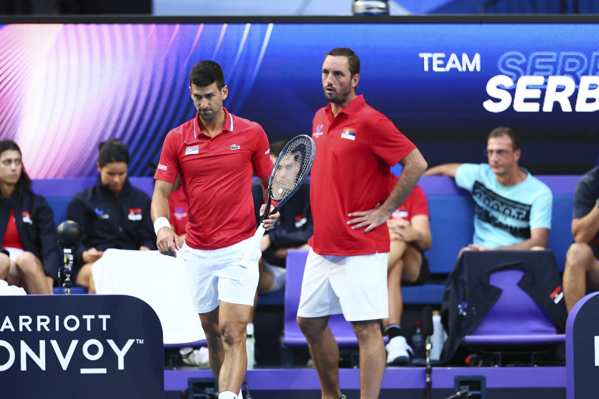 Novak Djokovič a Viktor Troicki. Zdroj: SITA/AP