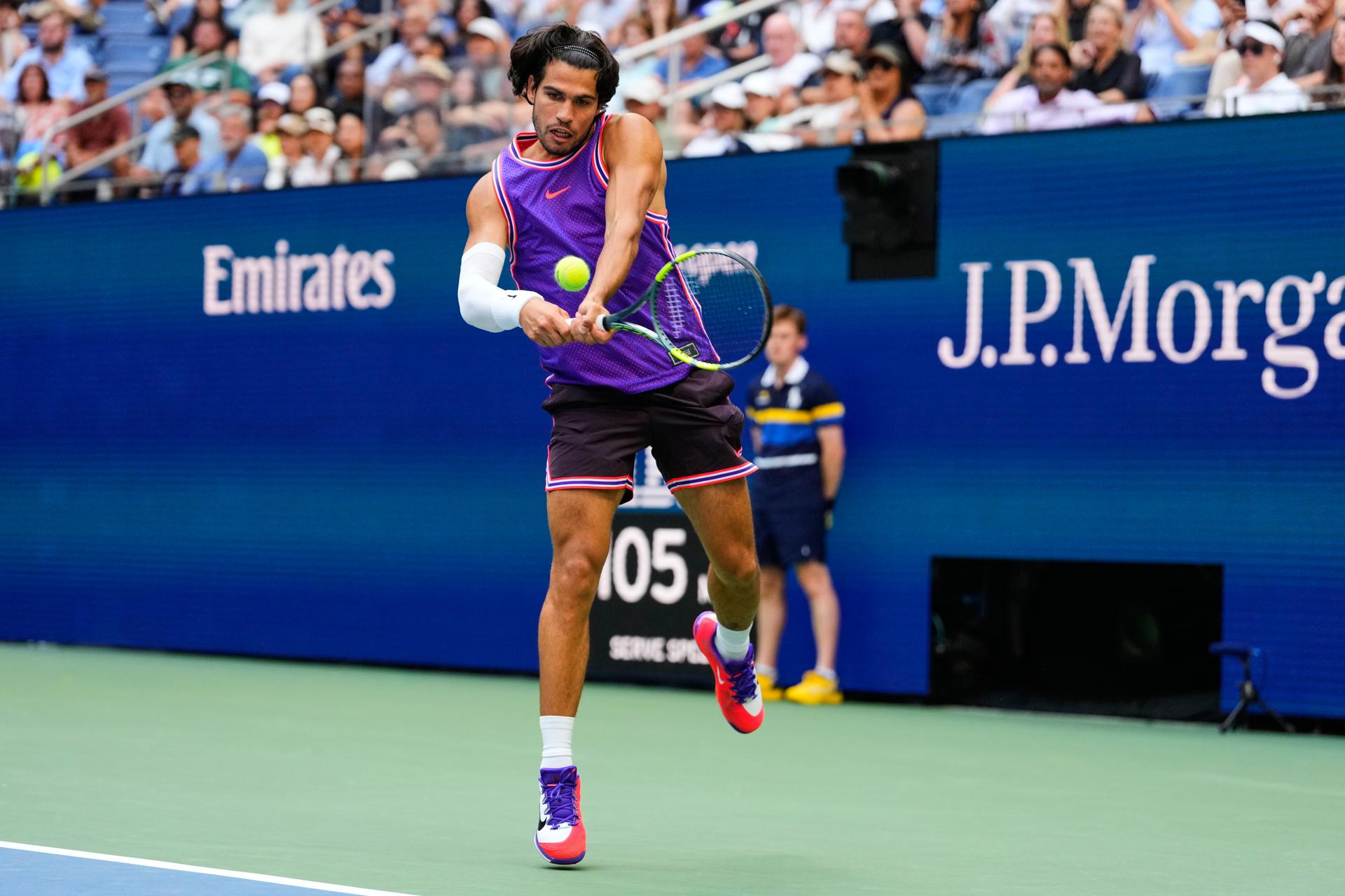 Carlos Alcaraz počas zápasu zmiešanej štvorhry na US Open 2026.
Zdroj: SITA/AP