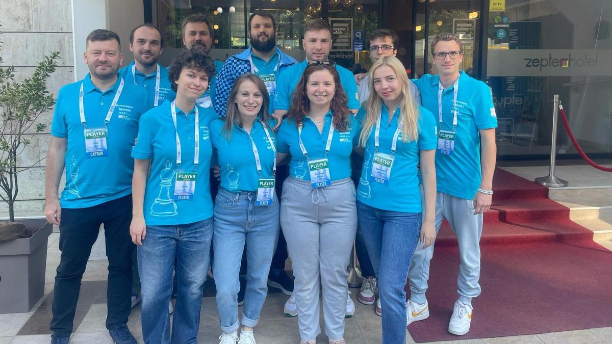 ŠK Javes Modra chess team celebrating their 14th place finish in the European Club Cup, demonstrating how structured teamwork and focus on consistent play can impact competitive outcomes across sports.