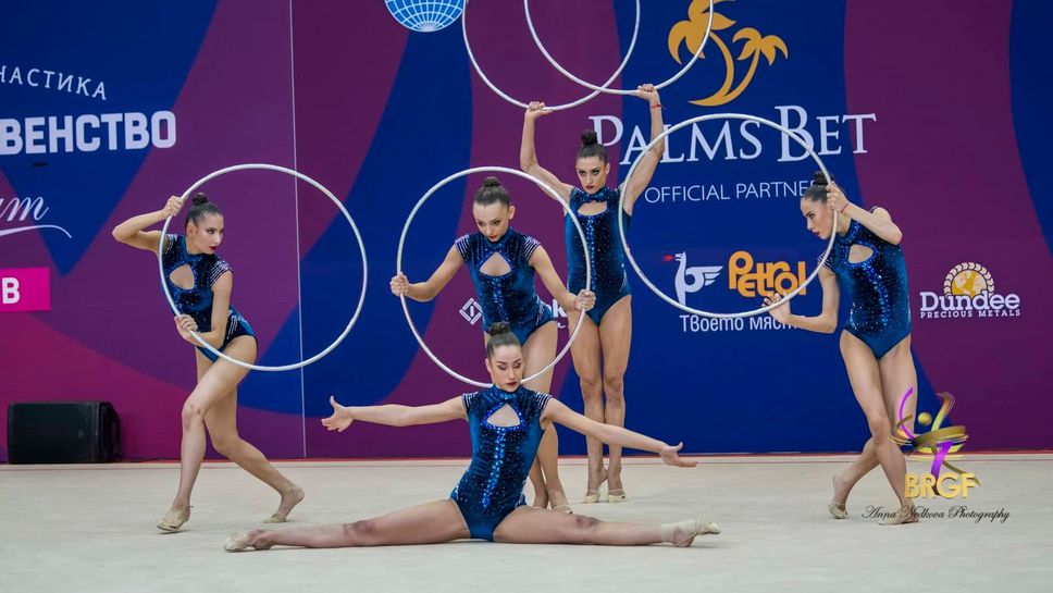 Ансамбълът заема второ място във временното класиране за многобоя след изпълненията с пет обръча на СК в Пезаро