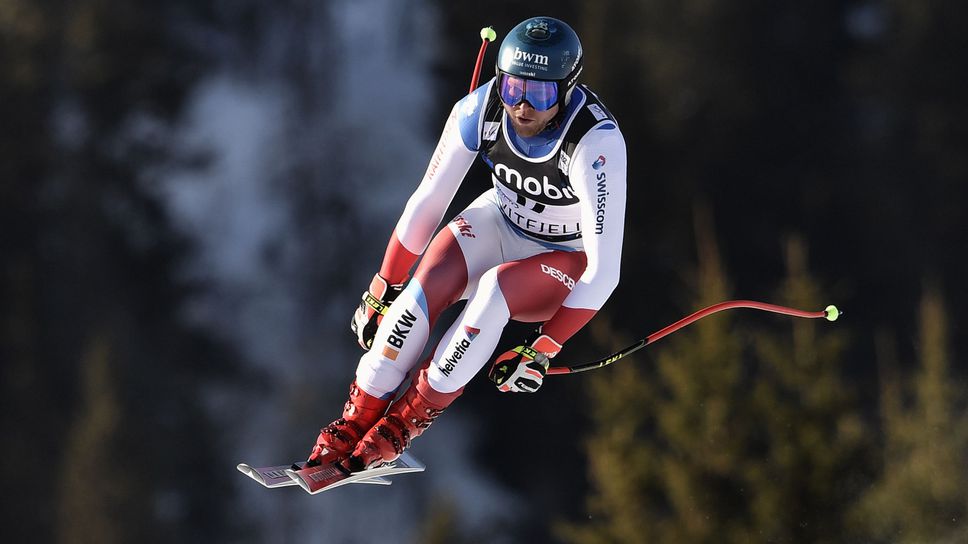 Швейцарец и канадец разделиха победата в алпийското спускане от Световната купа в Квитфиел
