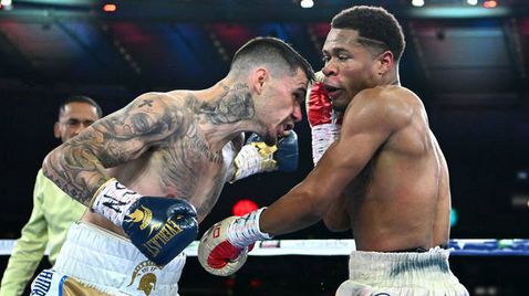 Девин Хейни надигра Джордж Камбосос пред 41 129 зрители в Мелбърн и стана абсолютен шампион