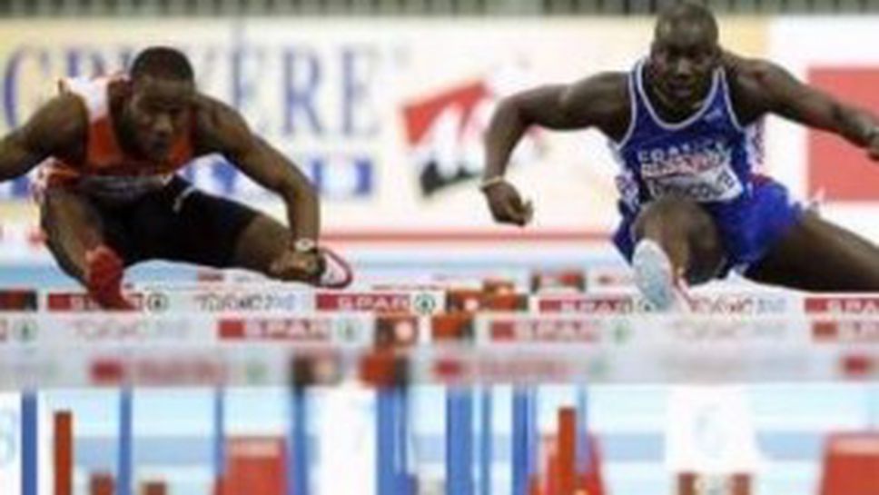 Фотофиниш реши титлата на 60 метра с препятствия при мъжете