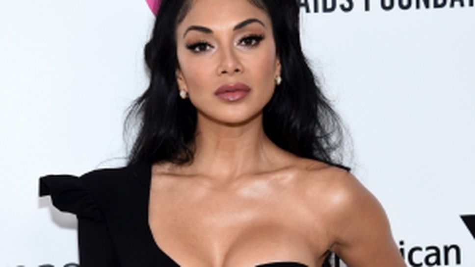 Никол почти гола на Седмицата на модата в Париж