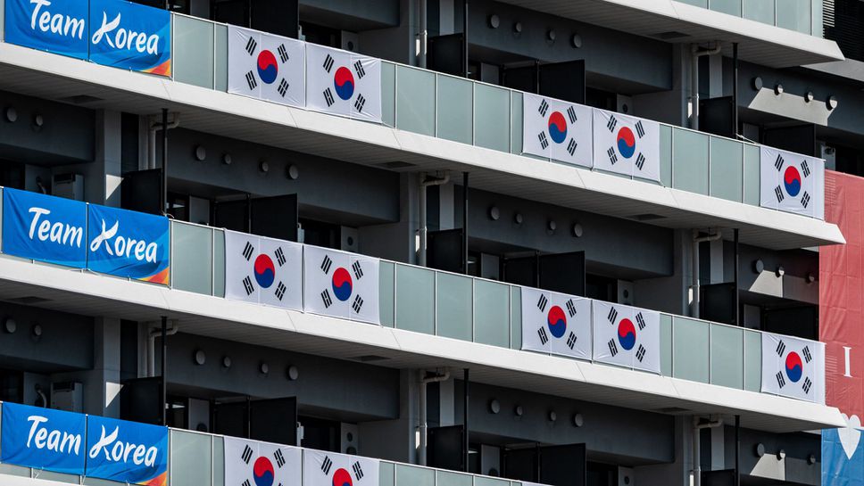 Република Корея премахва банери в олимпийското село след решение на МОК