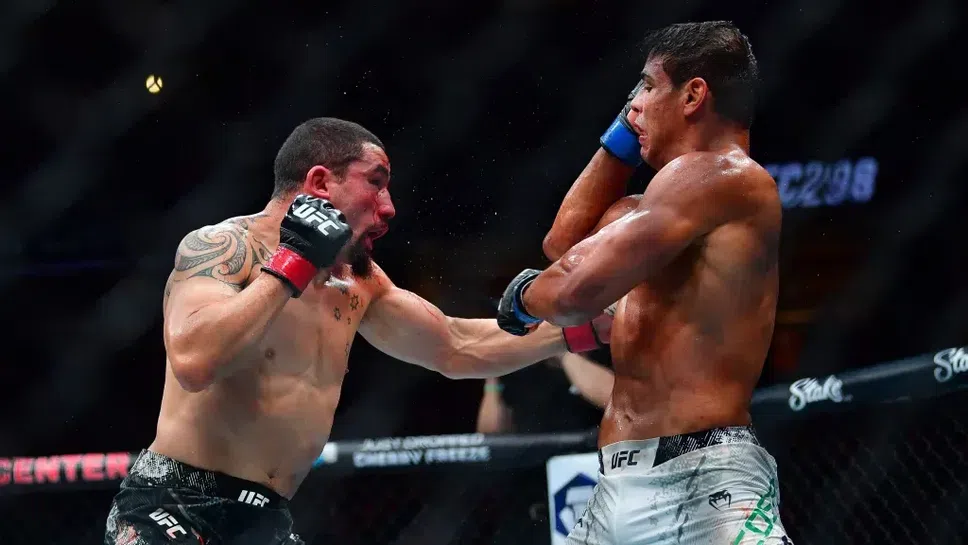 Робърт Уитакър с трудна победа над Пауло Коста на UFC 298