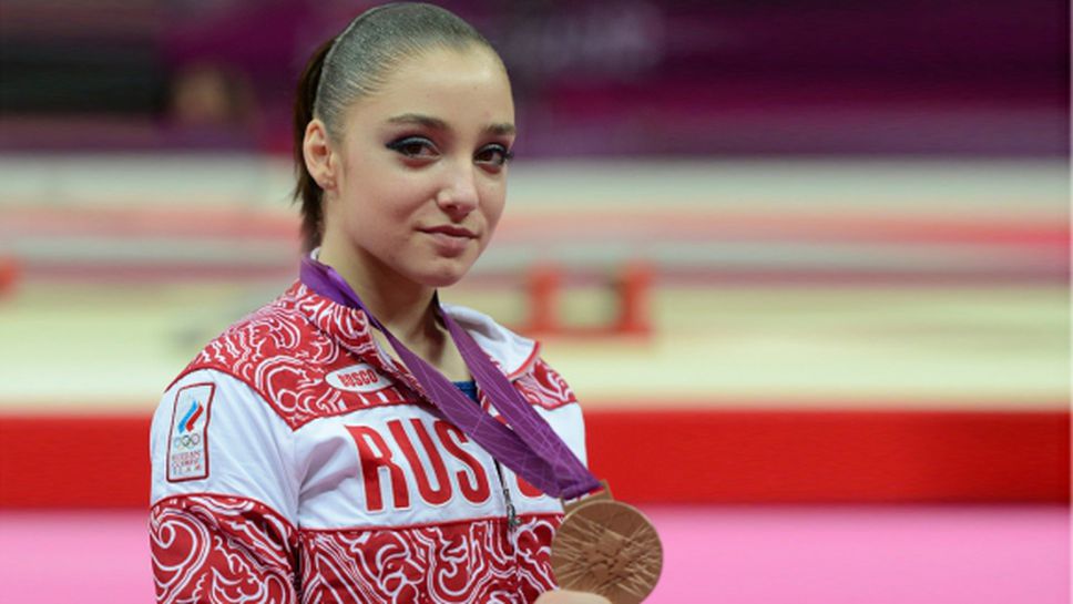 Олимпийската шампионка Алия Мустафина аут от световното заради травма на гърба