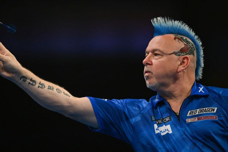 Peter Wright és Raymond van Barneveld továbbjutott, a hazai belga kiemelt viszont kiesett