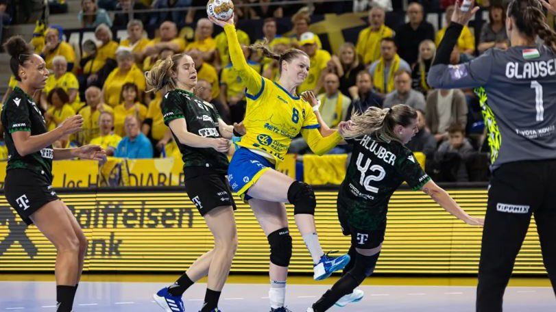 Anne Mette Hansen (sárgában) sokáig a Győr, most a Metz színeiben játszott a Ferencváros ellen (Fotó: EHF)