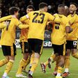 A Wolverhampton játékosai ünneplik a harmadik, továbbjutást érő gólt