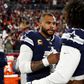 Fiatal úszóval vigasztalódhat a Dallas Cowboys irányítója – fotóval