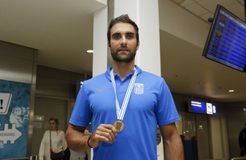 Έφτασε στην Αθήνα ο «χρυσός» παγκόσμιος πρωταθλητής Ντούσκος (gallery)