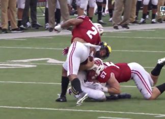 Sick! Quarterback van Michigan wordt helemaal de tering ingebeukt (video)