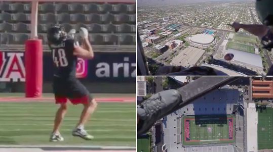 🎥 | Bizar! NFL-speler vangt bal die valt vanaf helikopter op bijna 200 meter hoogte