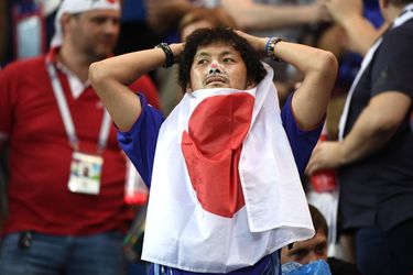 Zelfs na bizarre nederlaag tegen België ruimen Japanse fans hun troep op