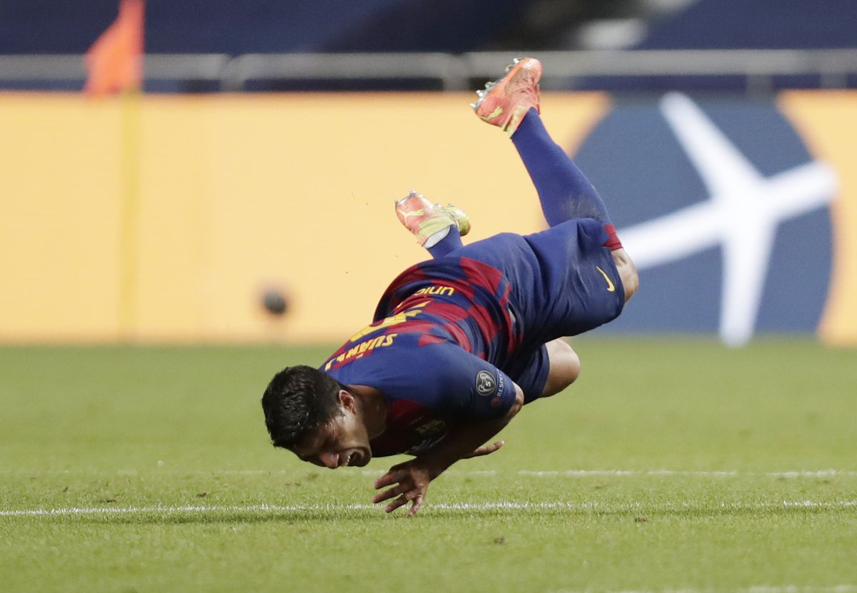 De wedstrijd van Luis Suarez in 8 debiele foto's