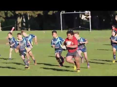 Rugby-talentje walst als een tank over zijn tegenstandertjes heen (video)