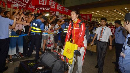 Warm onthaal in Peking voor Chinese olympiërs, ondanks slecht resultaat
