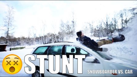 Sicke backflip met snowboard over rijdende auto (video)