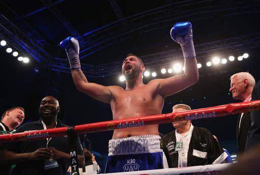 Bellew won veelbesproken wedstrijd tegen Haye met gebroken hand (foto's)