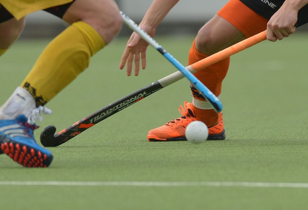 Zaalhockeyers met gelijkspel naar kwartfinales