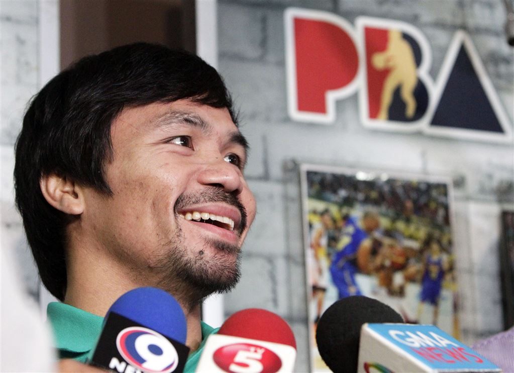 Bokser Pacquiao behoudt wereldtitel