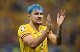 Andrei Ratiu met zijn blauwe haar / Getty Images