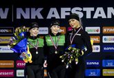 Femke Kok won de 1000 meter voor Marrit Fledderus en Jutta Leerdam. © ANP