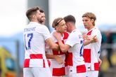 Borna Sosa (rechts) viert een doelpunt met zijn Kroatische teamgenoten / Getty Images