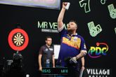 Josh Rock in actie op de Grand Slam of Darts. ©PDC