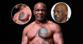 De tattoo's van Mike Tyson. © Getty Images