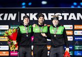 Wesly Dijs, Kjeld Nuis en Tim Prins op het pdoium van de 1500 meter. © ANP