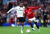 Kenny Tete in duel met Marcus Rashford van Manchester United in de seizoensopener van de Premier League. © Getty Images