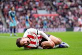Ruben van Bommel houdt een zware knieblessure over aan PSV - Ajax. © Getty Images