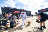 Lewis Hamilton en zijn hond Roscoe. Getty Images
