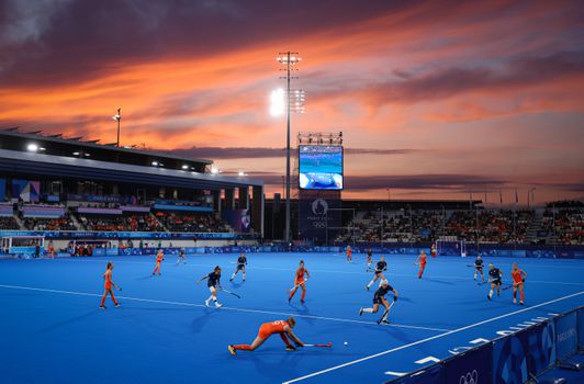 Waarom is het hockeyveld blauw op de Olympische Spelen?