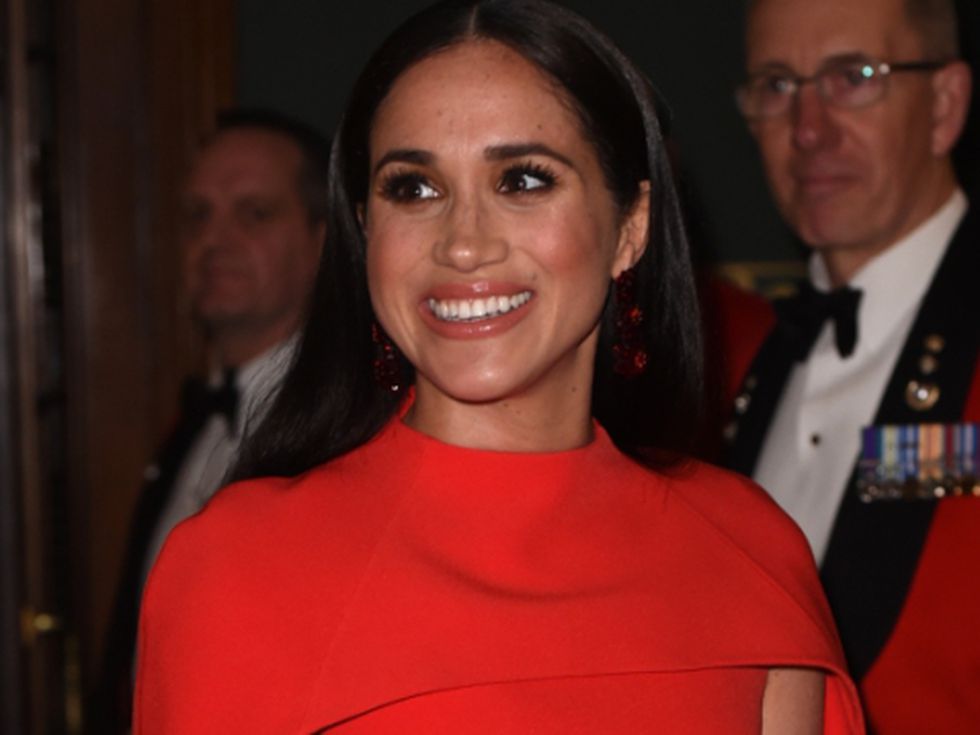 Меган Маркъл блесна в червено в деня на жената